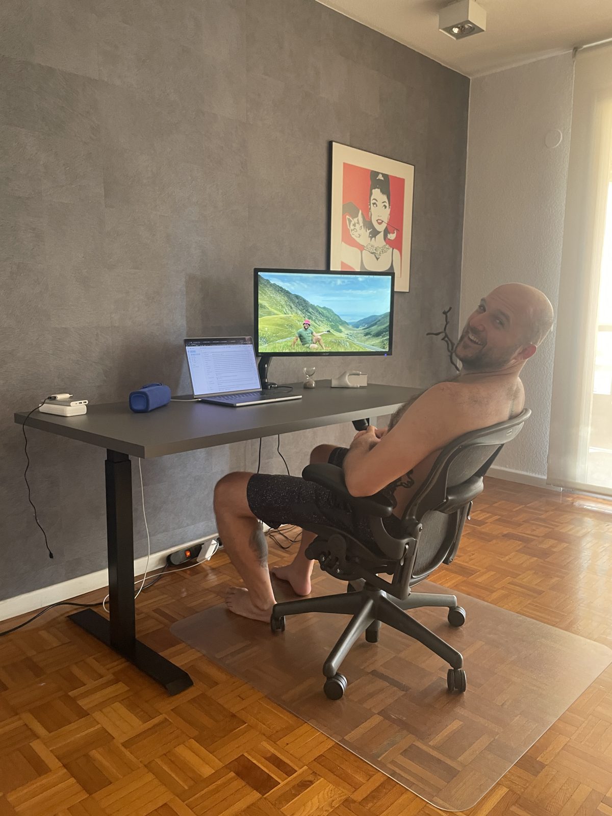 Dimitry at his home office desk in Spain