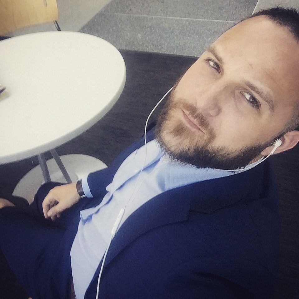 Dimitry in a suit between meetings
