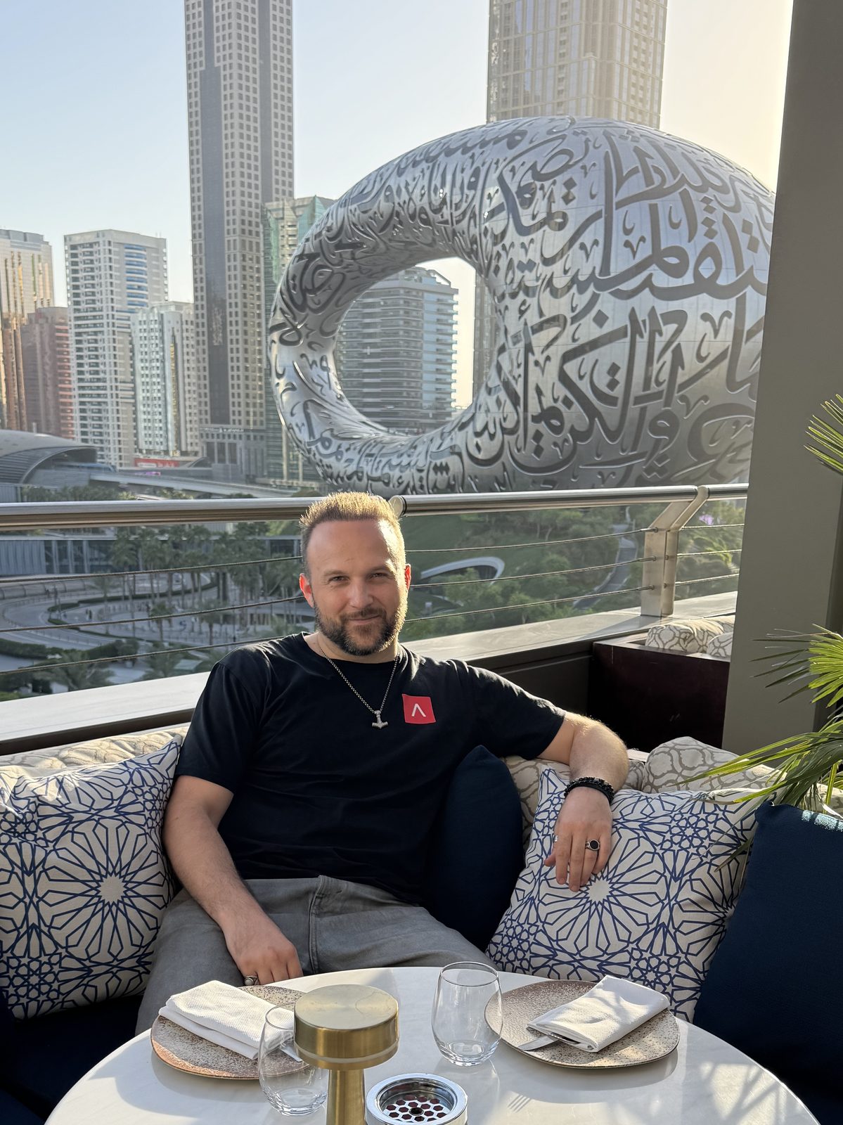 Dimitry on a terrace facing the Museum of the Future