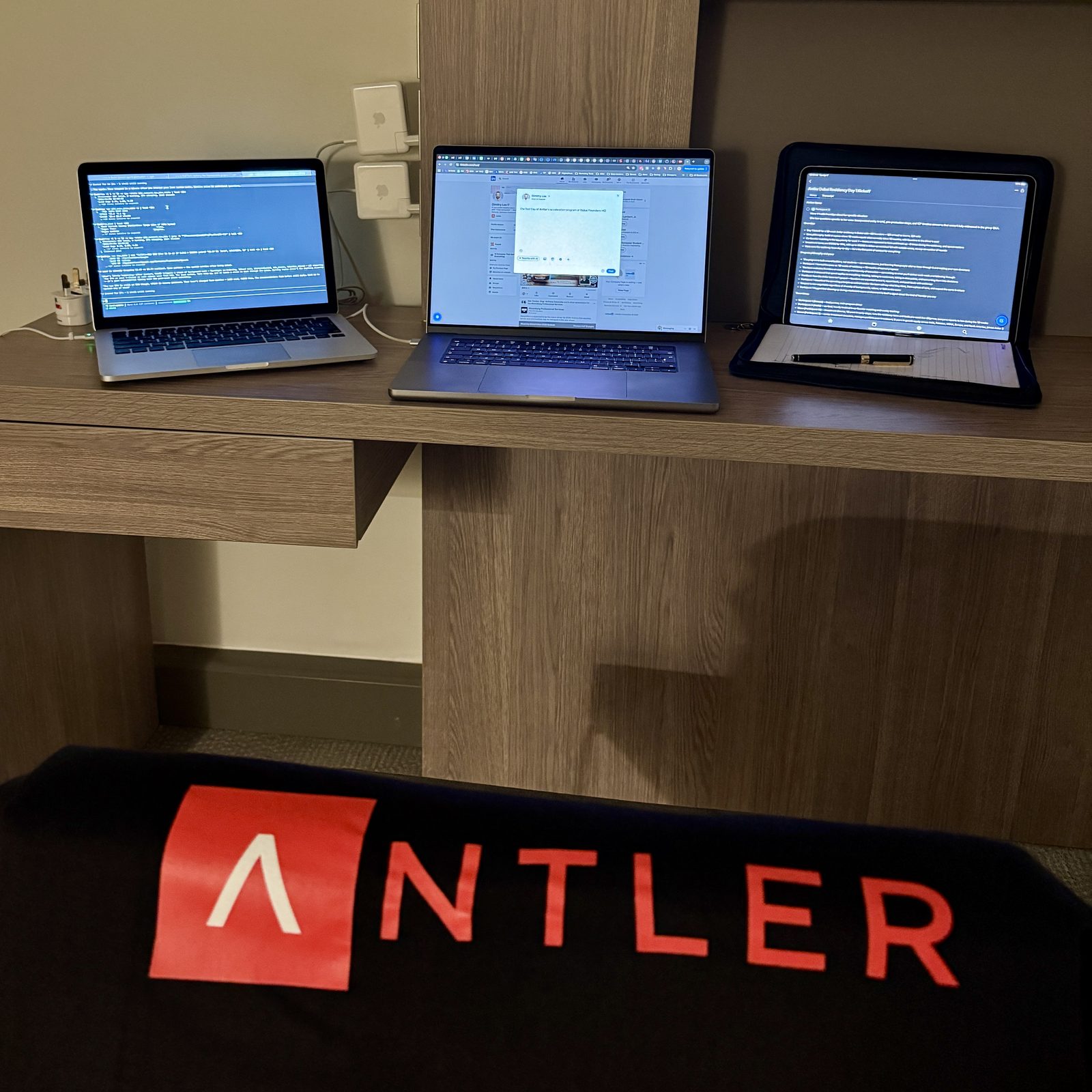 Three screens and an Antler shirt during the accelerator